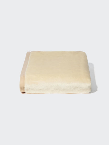 Uniqlo Heattech Muff Single
